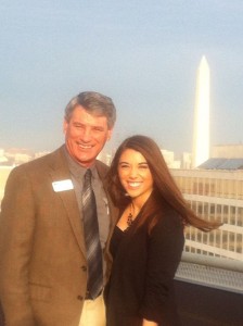 Jackie Newland and her father Joe, pose for a photo   with the Washington Memorial in the background.