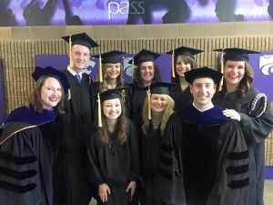 Graduates pose with Dr Baker and Dr Ellis following the graduation ceremony on May 16.