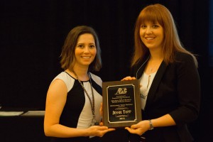 Jessie Topp accepting the award for Top Thesis Proposal.