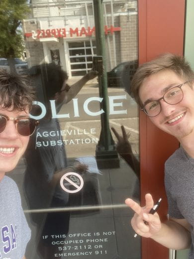 Two K-State students in front of the police substation in Aggieville, Manhattan, Kansas