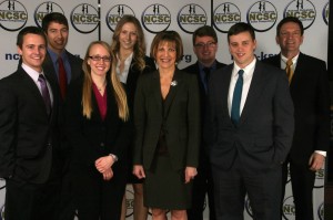 Deeter with students at national sales competition
