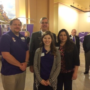Rep. Tom Phillips visits with Shawn Finch, Jessica Leichter and Amanda Morales at Cats in the Capitol.