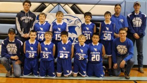 Will Clark, with a junior high basketball team he coaches.