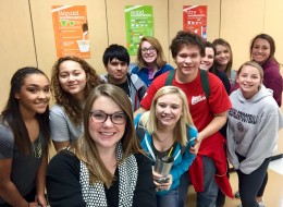 Kacie Fredrickson, front, is surrounded by some of her Family and Consumer Science students at Buhler High School, Buhler School District 313.