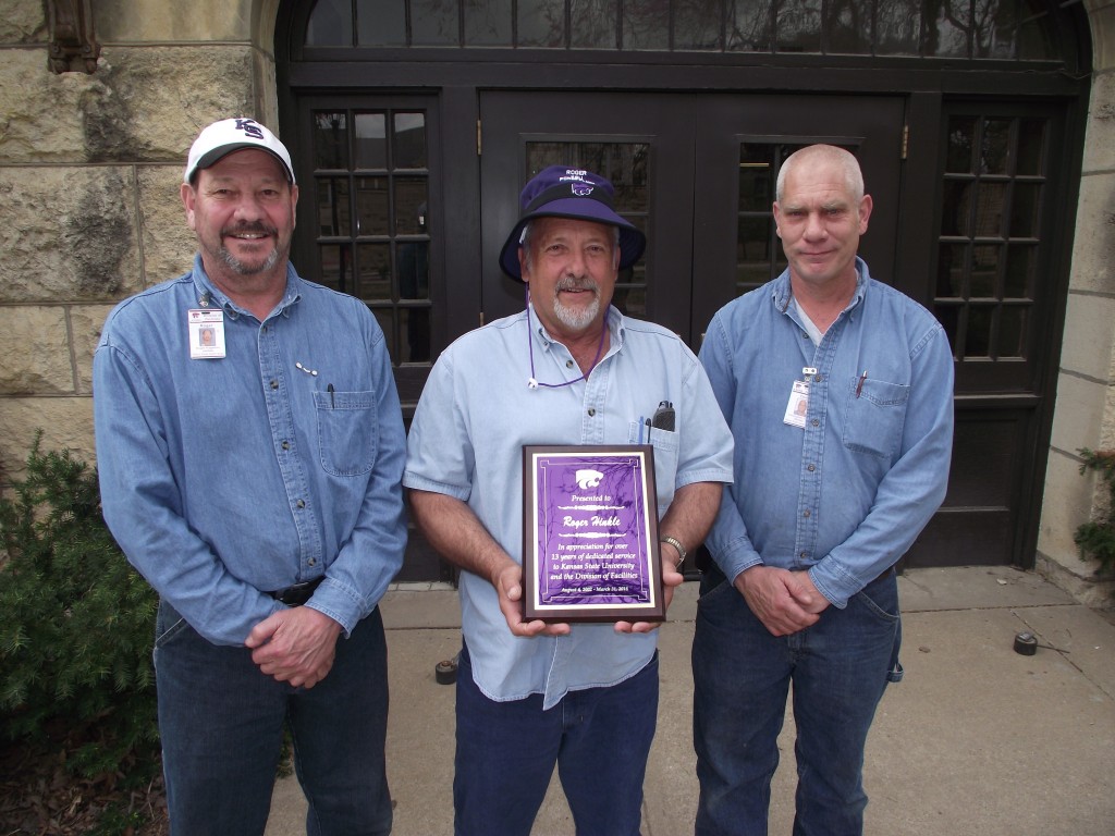 Roger Hinkle (middle) with co-workers, Chris Falley (right) and Roger Hageman (left)