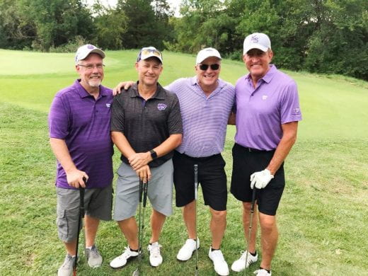 Team of golfers at Rob Regier Memorial Golf Tournament